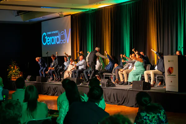 The Hypnotist performing at an elegant gala dinner